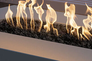 Fire Bowls and Fire Features for Pools: Designing Outdoor Spaces That Feel as Good as They Look